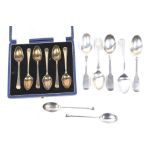 A collection of silver tea and coffee spoons. Comprising a set of six silver-gilt coffee spoons.