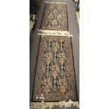 A pair of Persian style wool rugs.