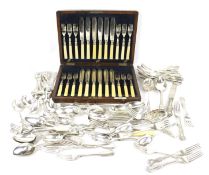 An assortment of silver plated flatware. Including a W.
