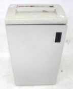 A HSM paper document shredder. Model 108.
