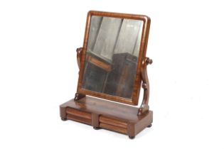 A Victorian mahogany swing toilet mirror.