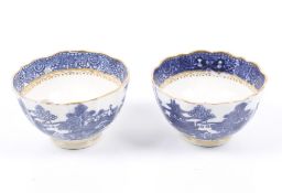 A pair of late 18th century caughley blue and white tea bowls.