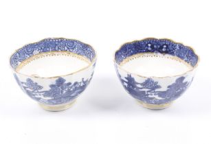 A pair of late 18th century caughley blue and white tea bowls.