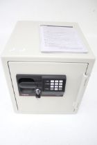 A Sentry S3817 combination key safe and instruction booklet. Key present, comb.