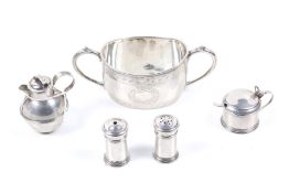 A collection of silver including an oval sugar bowl.