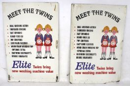 Two vintage Elite 'Meet the Twin' advertising signs.