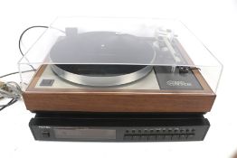 A Linn Sodek LP12 Transcription Turntable and a Rotal tuner. Consisting turntable, Serial No.