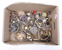 An assortment of costume jewellery. Including bangles, earrings, chains, watches, etc.