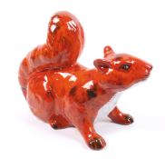 An Anita Harris signed figure of a red squirrel.