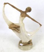 A contemporary resin model of an Art Deco woman.