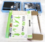 A Ninetendo Wii and a selection of games. Including a Wii Sports Resort pack, Wii Fit Plus, etc.