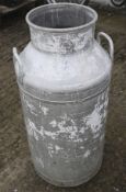 A galvanised milk churn.