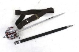 A reproduction sword and leather holster.