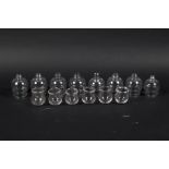 A group of eight and six glass cupping cups. The first set with knob finials. Max circa H8.