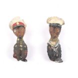 A pair of early 20th century miniature naval figures.