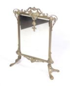 Late 19th century brass fire screen with bevelled glass mirror ornate cast decoration. 91.