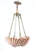 An Art Deco pendant ceiling light formed as an Alabaster ceiling light formed as scallop shells and