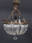 Early 20th century 'Drop Bag' ceiling light fitting with glass lustres and fleur de lys style top.