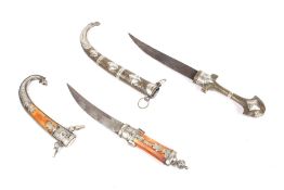 Two Middle Eastern khanjar daggers.