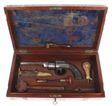 MANTON transition revolver with accessories in fitted wooden case.