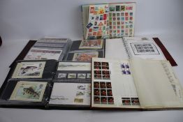 A collection of stamps and PNQs. Comprising mainly royalty thematics etc in 10 albums.