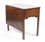 A mahogany three drawer writing table with drop leaf extension.