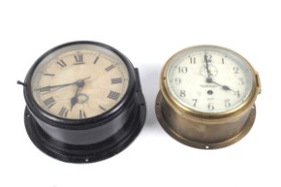 Two ship bulkhead clocks.