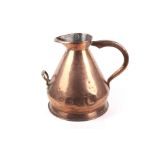 A large Victorian copper harvest jug with two handles and LCC measures stamp.