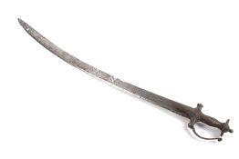 A North Indian talwar sword. With disc shaped pommel and engraved guard extension. Some rust. L89.
