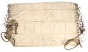 A vintage possibly naval canvas and rope hammock