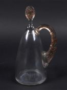 R Lalique 'Prunelles' carafe (Pour Cusenier) : With moulded sepia-coloured handle and stopper with