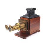 A mahogany cased Salanson & Co of Bristol Magic Lantern with carry box. The lantern L54cm.