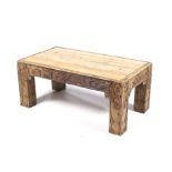 An Italian style wooden coffee table with inset polished stone top.