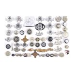 A collection of St John Ambulance Association badges.