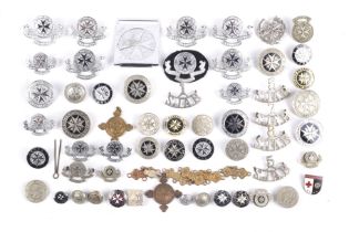 A collection of St John Ambulance Association badges.