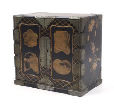 A Japanese Meiji period black and gold laquered table cabinet.