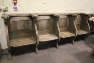 A large 19th century oak four-seater monk's benk/church pew.