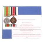 A WWII Defence Medal (unmarked) and Special Constabulary Long Service Medal (marked HORACE H.