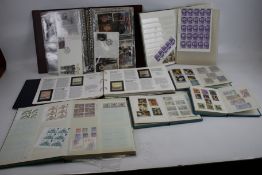 An extensive collection of mint and used stamps in eight albums plus packets.