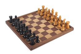 Wooden chess board and chess set. The board 45cm x 45cm Condition Report: kings 10.