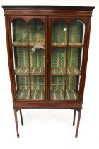 An Edwardian display cabinet.