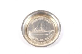 A Norwegian small silver dish decorated with the steam yacht 'Meteor' of the BDS Line.