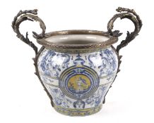 A blue, yellow and white glazed reproduction jardiniere with Italian decoration,