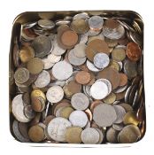 A tin of world coins.
