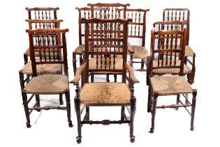 A set of ten 19th century oak ladder back dining chairs.