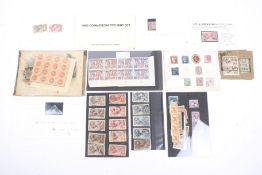 An assortment of worldwide stamps. Including 1946 Hong Kong, 1982 Commemorative Mint set, etc.