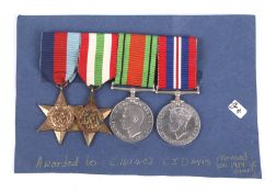A set of four WWII medals. Two GRI VI Star medals (left example marked C 169402 C.J.