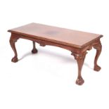 A late 20th century mahogany coffee table.