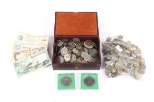 A box of world coins and a quantity of gaming tokens