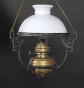 A 19th century pendant ceiling gas lamp with cast iron frame and white glass domed shade.